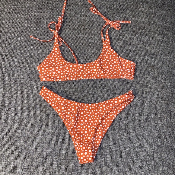 Swimsuit set. Burnt orange with white flowers. Top xsmall and bottom small. - Picture 3 of 6